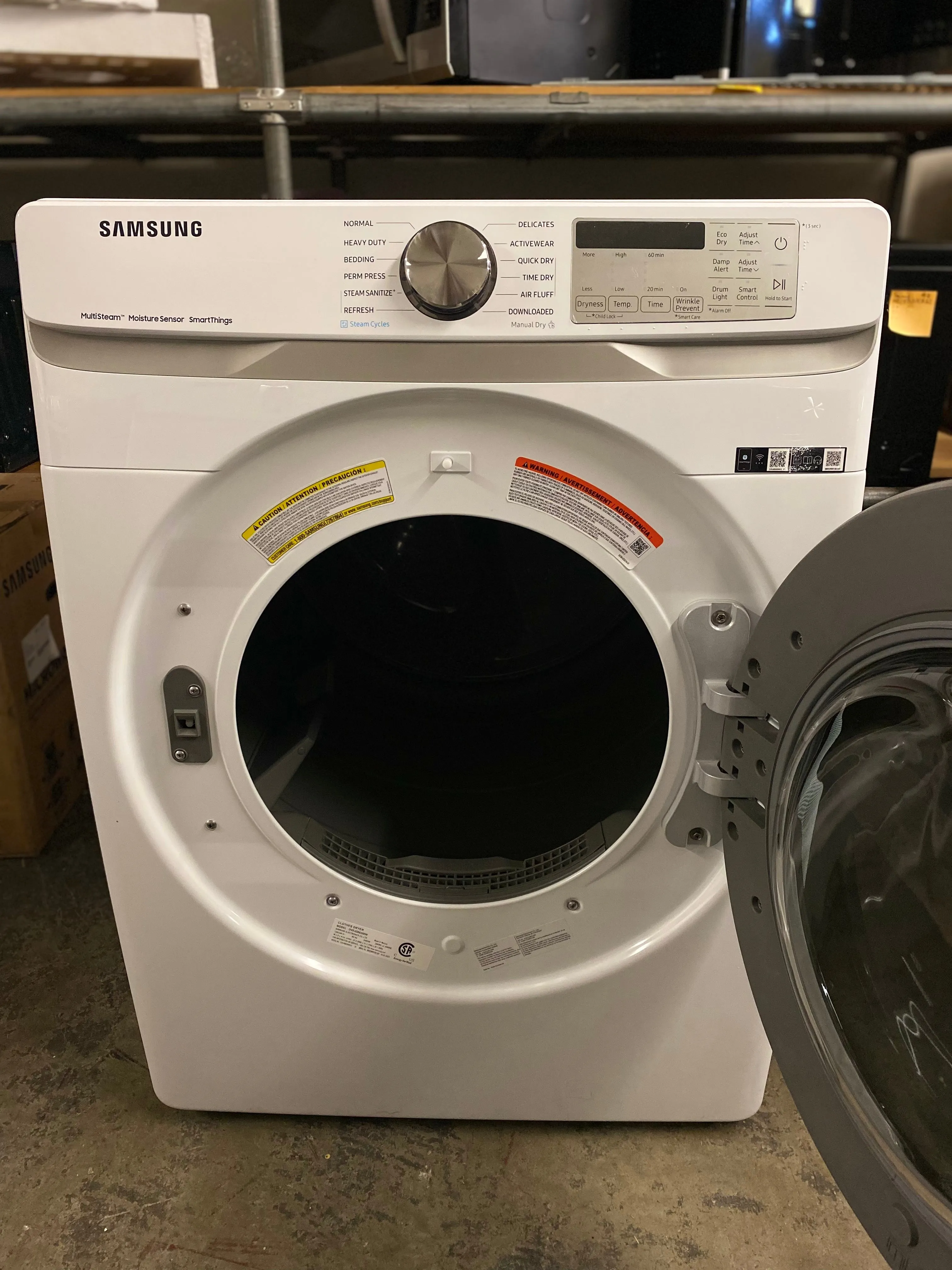 Samsung DVE45B6300W 27 Inch Electric Smart Dryer with 7.5 Cu.Ft. Capacity, Steam Sanitize , Sensor Dry, Wi-Fi Connectivity, 21 Dry Cycles, 10 Dry Options, 5 Temperature Settings, Interior Drum Light, 4 Way Venting, and ADA Compliant: White